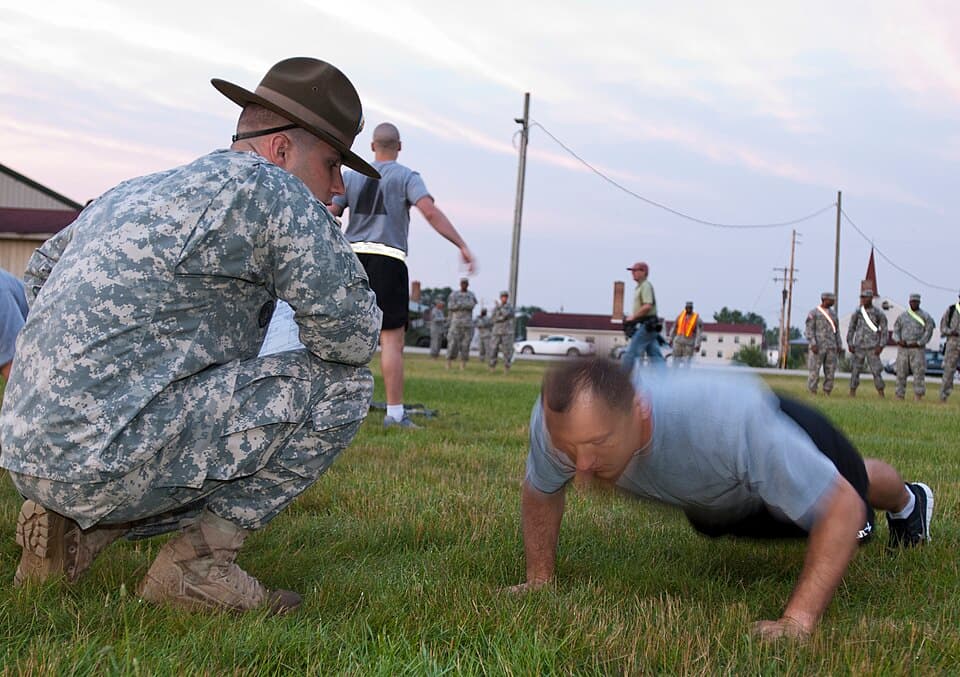 Sgt. 1st Class Richard Silva, member of the 11th Battalion Army Reserve Careers Division, located in Los Alamitos, Calif., does pushups as part of the Army Physical Fitness Test du