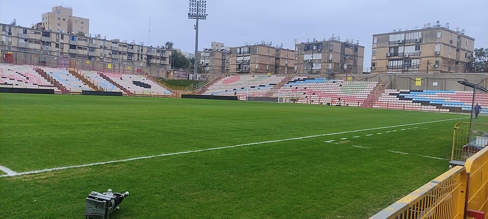 The main stand and pitch at Yud-Alef Stadium in Ashdod