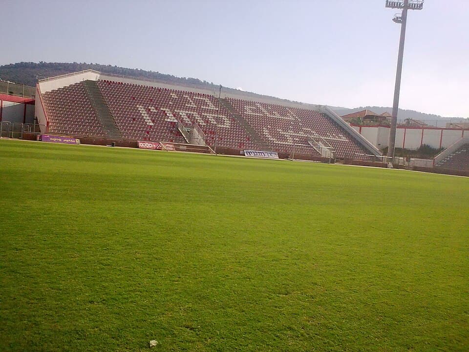The pitch and main stand of the Doha Stadium in Sakhnin