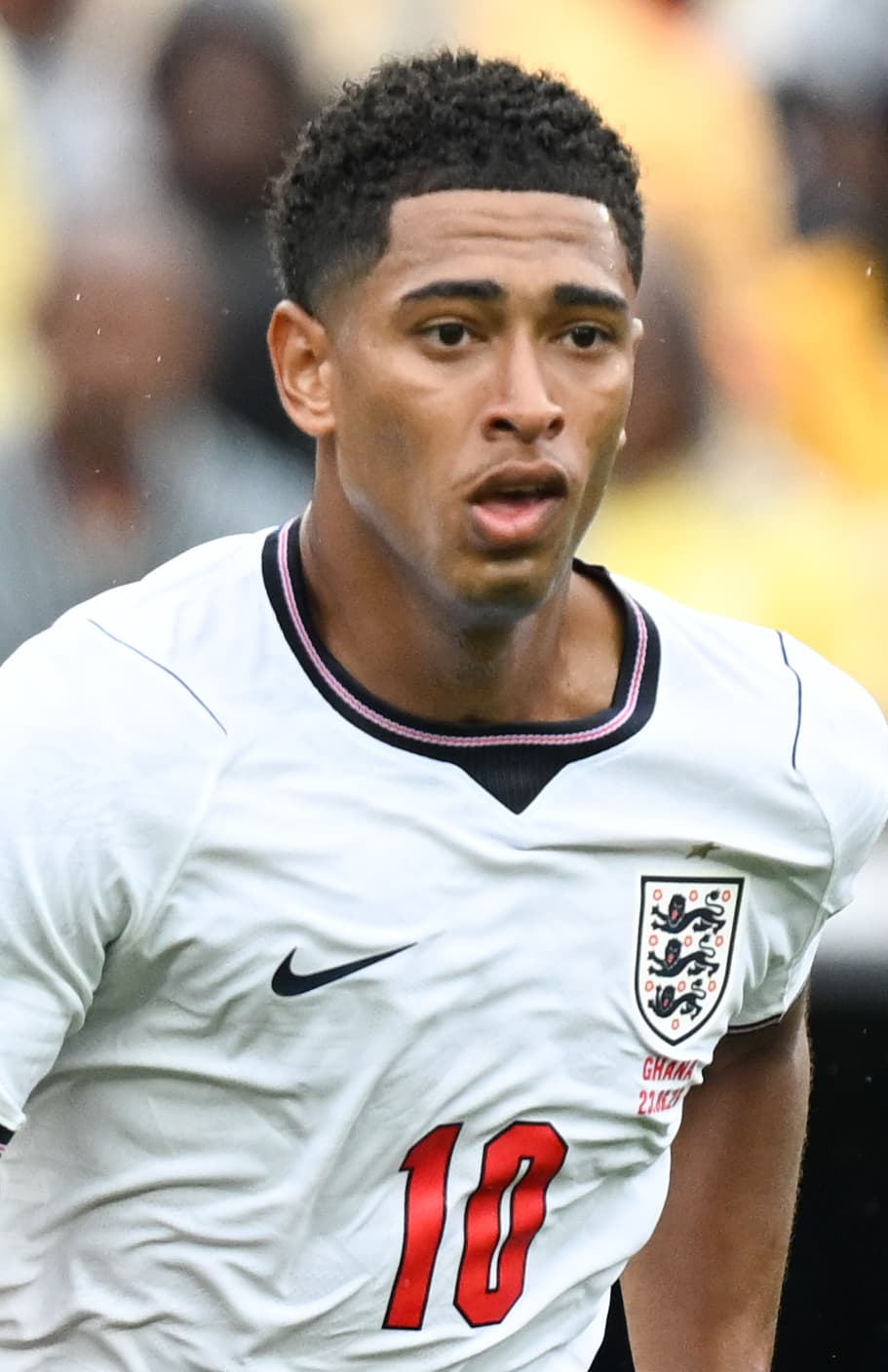 FOXBOROUGH, UNITED STATES - June 23: Kwasi Sibo #8 of Ghana is in action against Jude Bellingham #10 of England during the FIFA World Cup 2026 Group L match between England and Gha