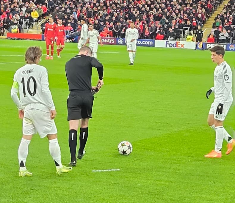 Luka Modric (left) and Arda Guler (far right) in the Real Madrid vs Liverpool match