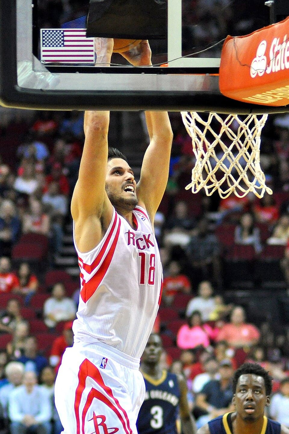 Omri Casspi of the Houston Rockets goes up for a dunk during an NBA preseason basketball game against the New Orleans Pelicans, October 5, 2013, at the Toyota Center in Houston, Te
