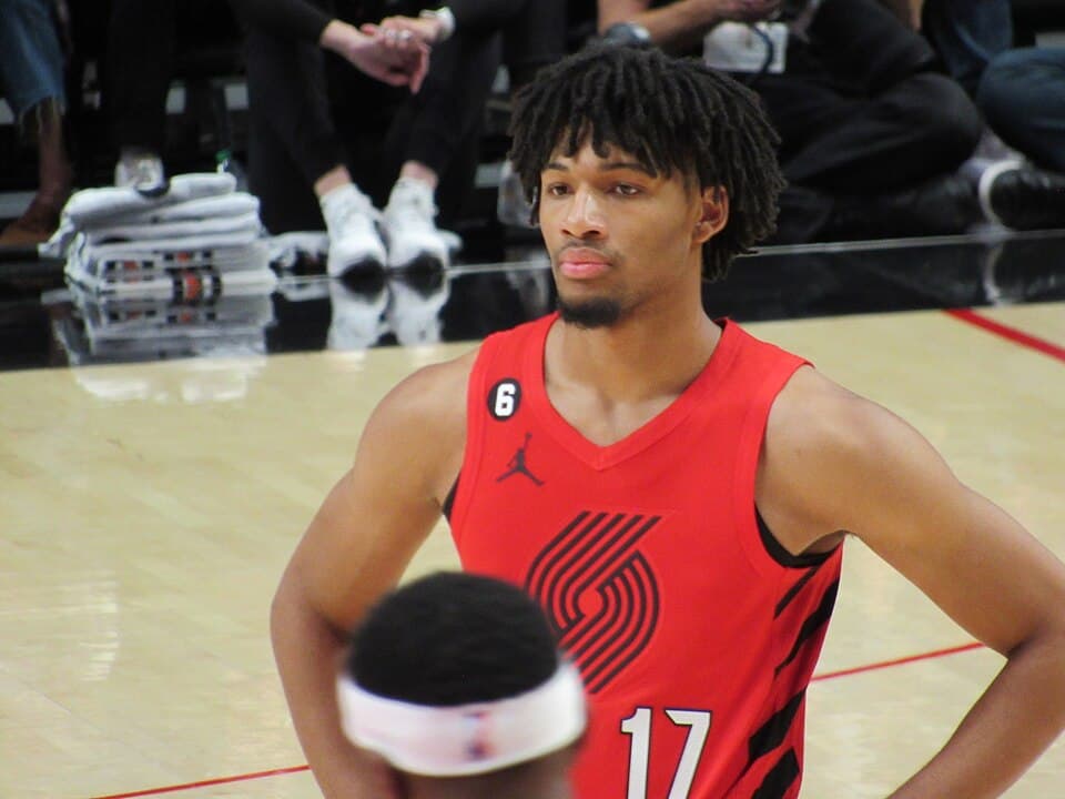 Shaedon Sharpe #17 of the Portland Trail Blazers follows a free throw attempt against the Phoenix Suns on October 21, 2022 at the Moda Center Arena in Portland, Oregon